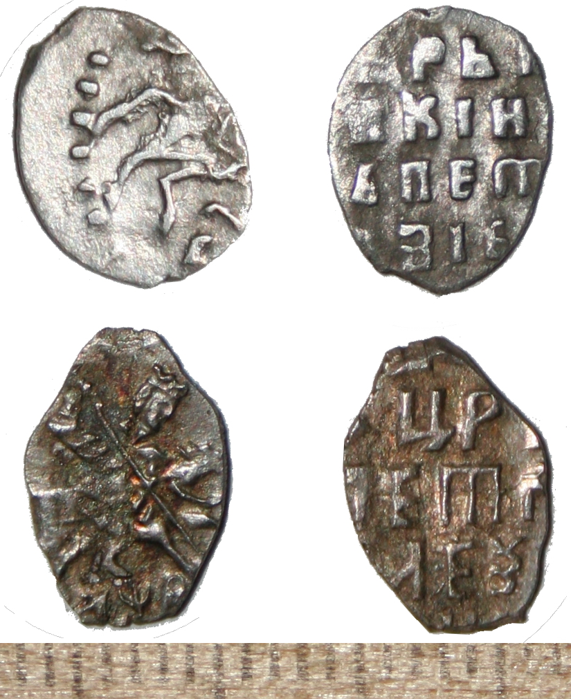 Монеты 1699 и 1702 гг